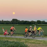 Moonlight over tandem riders