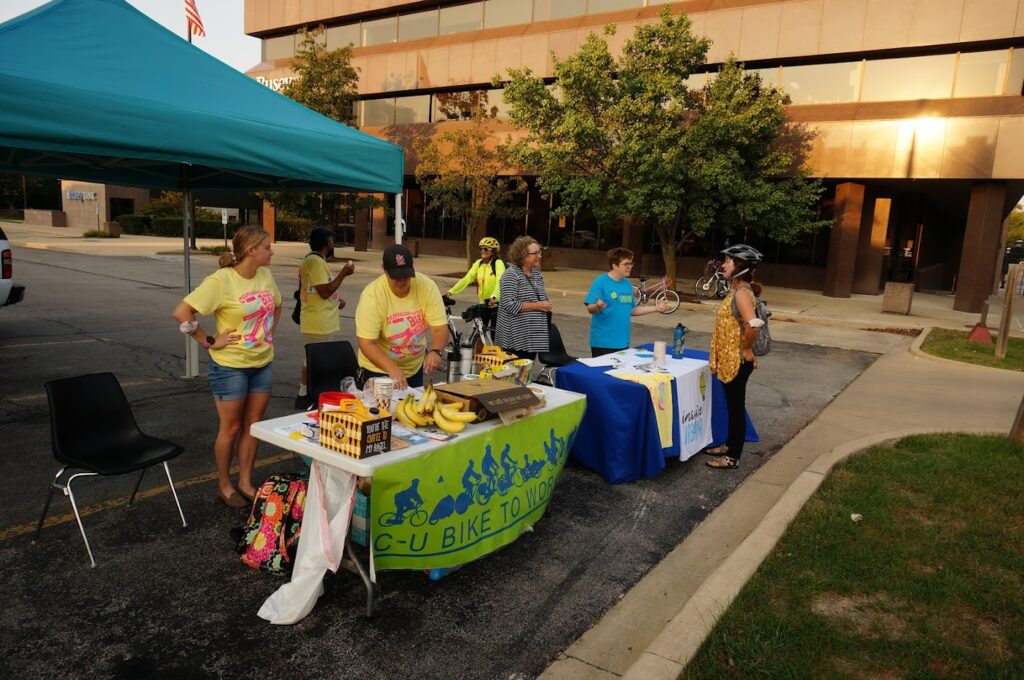 Volunteers working at a booth.